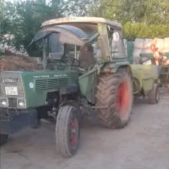 Fendt 104 mit HD-Ballenpresse