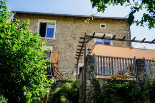 View from the back garden on the house with sun deck