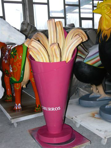 cornet de churros en resine et fibres de verre .peinture acrylique vernie 
160 cm de haut 