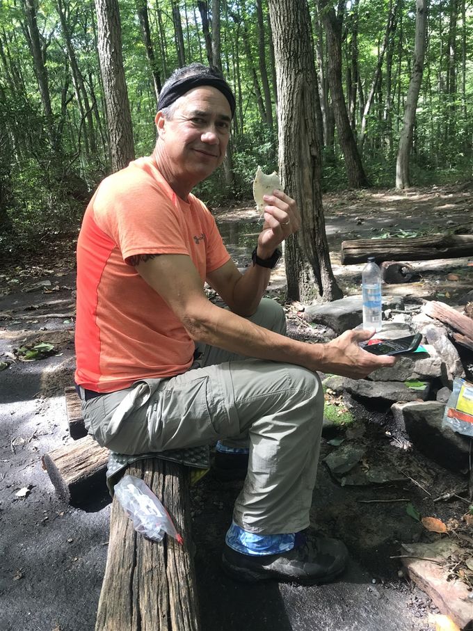 MacGyver  grabbing a quick lunch before the next climb.