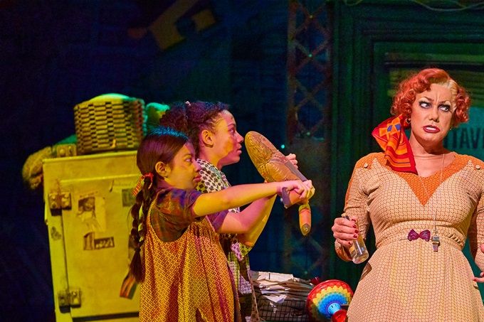 Craig Revel Horwood as New York orphanage proprietor Miss Hannigan with the orphans.