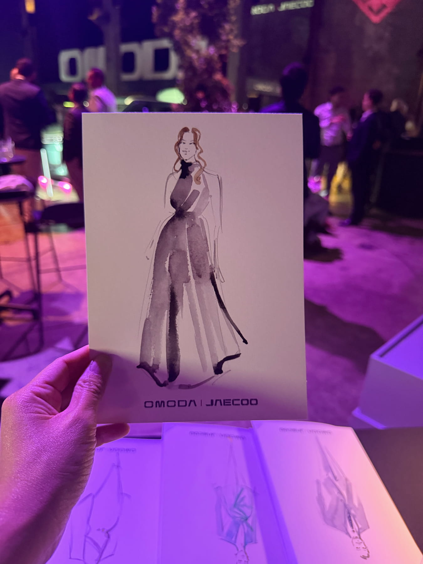 Live fashion illustration created at Omoda Jaecoo cocktail lunch event