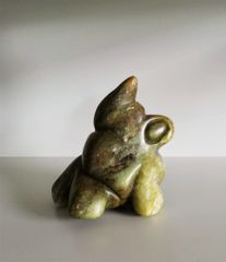 Lille grøn mand. Ca. 7 cm høj.