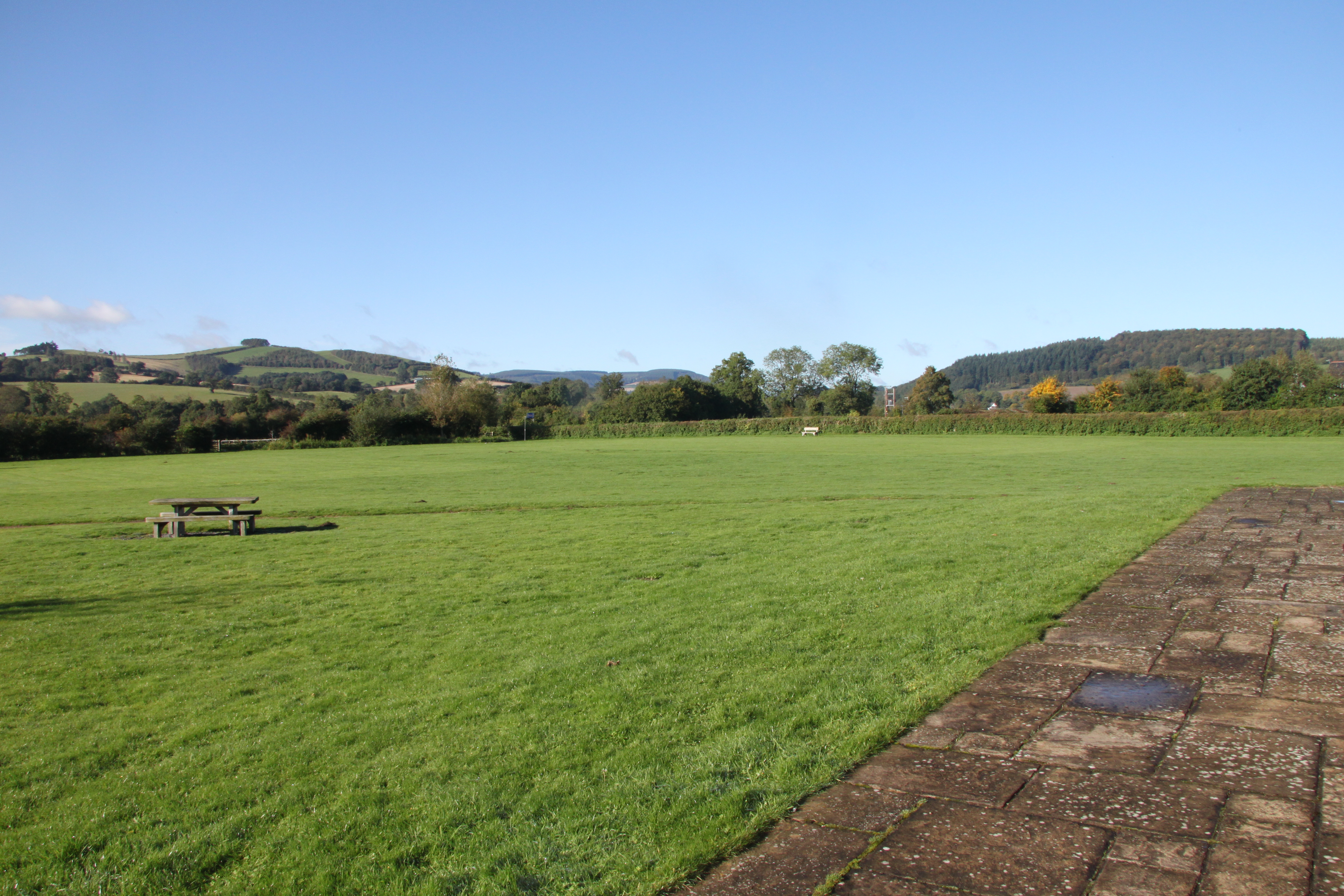 The Village Green at Aston on Clun and the famous "Blue Remembered Hills"