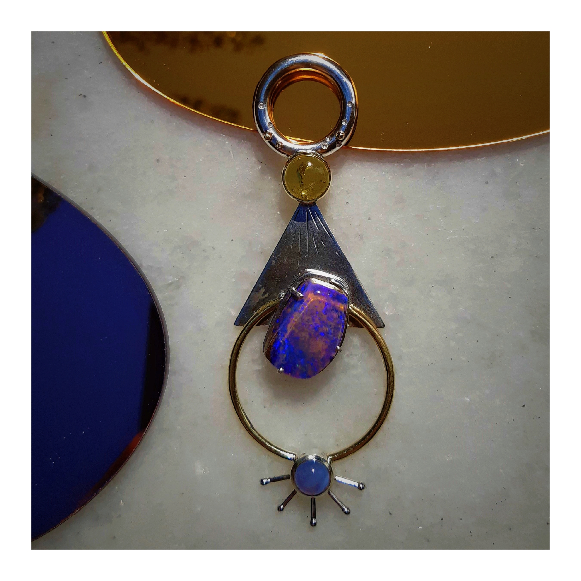 Hanger in goud en zilver met opaal