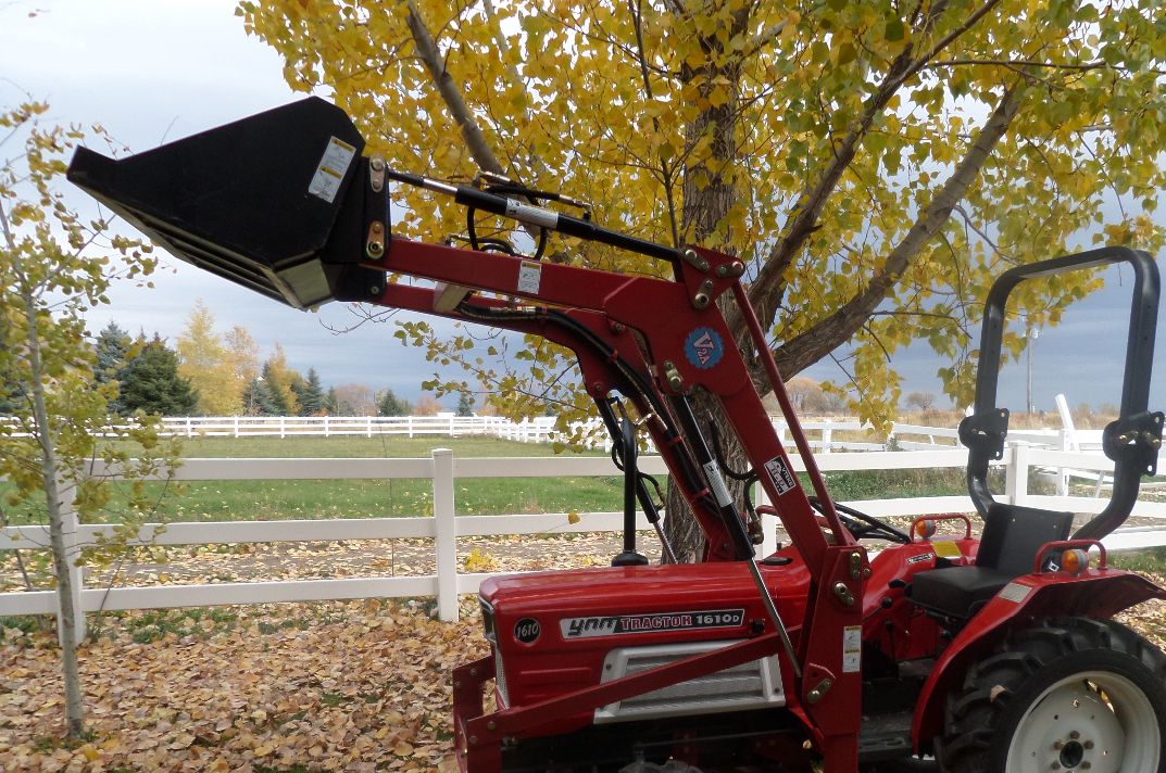 $11900 
20 HP YNM 1610-D 4x4 -3 cylinder Diesel 4x4  
big enough to pickup a good load of dirt in the bucket- with the 4x4 and Diesel engine enough power to get it loaded with dirt 
has a new loader, tires, Clutch, paint, seat ROPS, 
the loader has self leveling Bucket- and single stick joystick control 
4x4 or 2x shift out 
good little yard tractor- can operate a 4ft field mower- 4 ft tiller - and other smaller attachments 
don@biglittletractor.com --  208-390-2774  