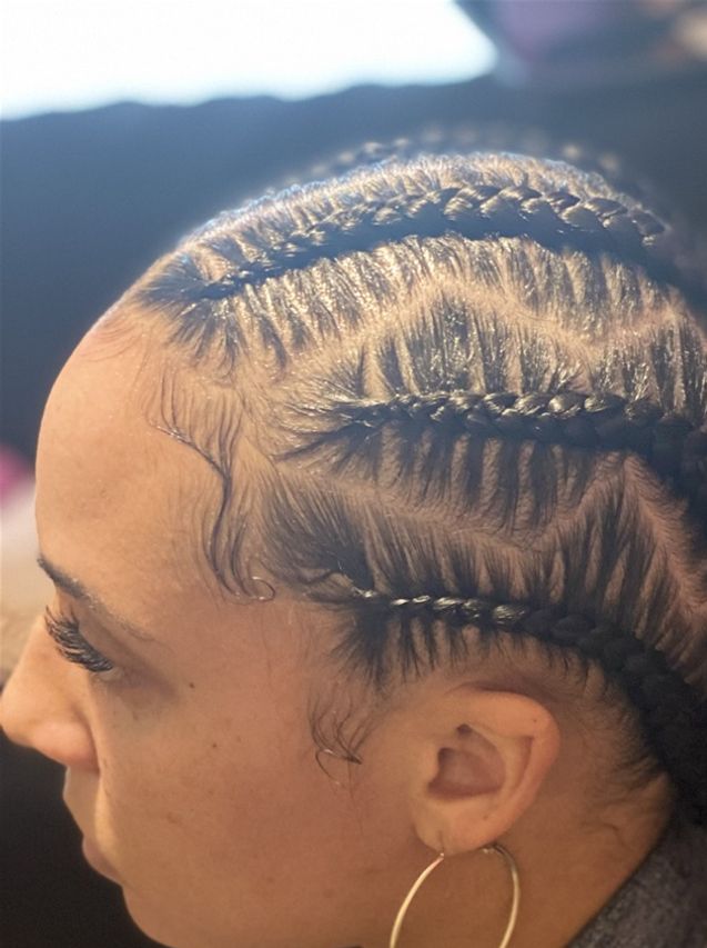 Zig zag Stitch braids into two buns