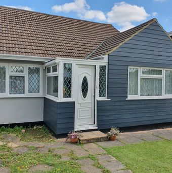 Anthracite Grey HardiePlank Cladding on Rainham bungalow in Kent