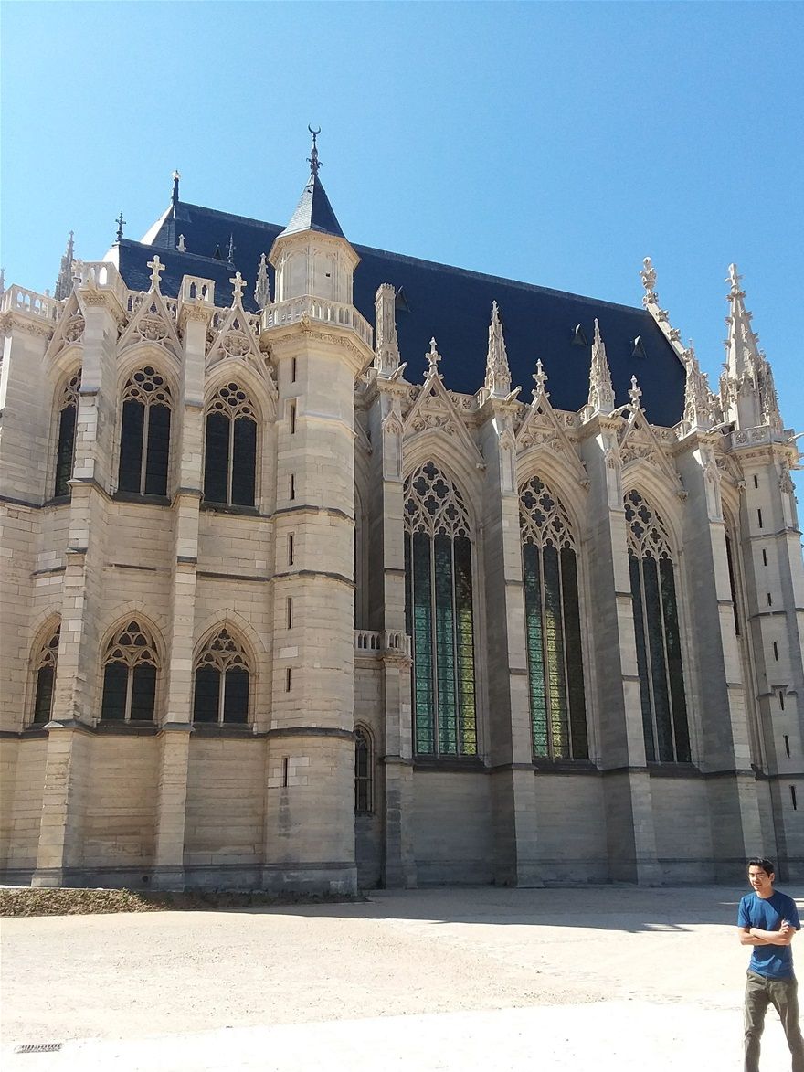 Taking a photo with Reno. The Royal Chapel is behind him. This is the only building that requires an extra entrance fee at Château de Vincennes and the fee is very small. We did not hesitate to get the tickets and we are quite miserly.