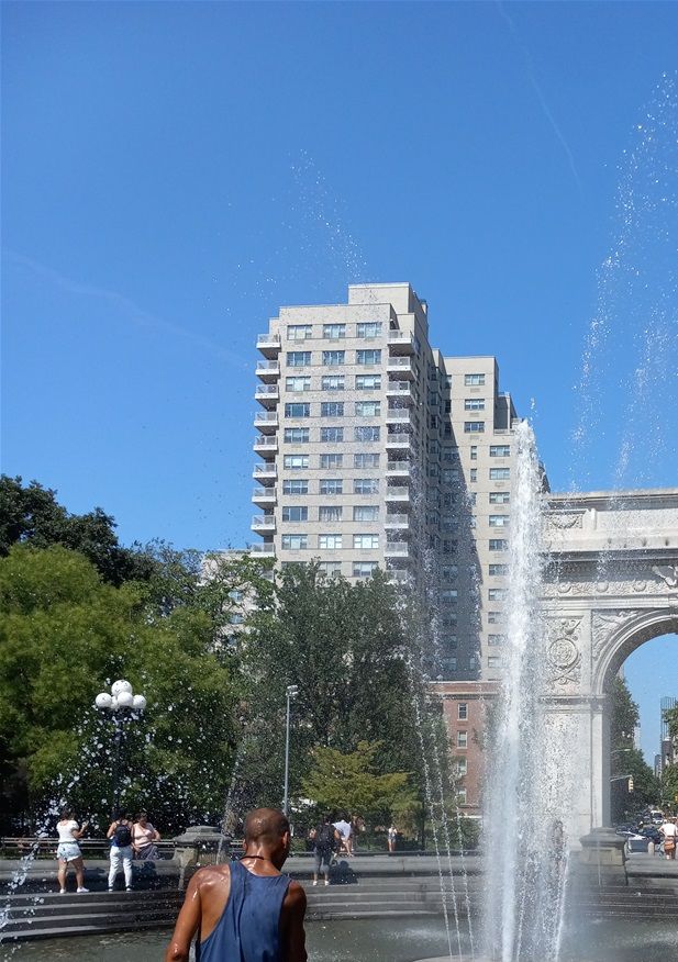 The opposite in size and atmosphere to Jane Street Garden is this park. This is Washington Square Park. It is also located in Greenwich Village but it is at the south end of 5th avenue. University students relax and study here quite often. Although you can not see it in this photo there are grassy areas and benches all around the park. There is also a statue of Giuseppi Garibaldi, the Italian nationalist hero here. It is in the area of the park called Garibaldi Plaza. On the other side of the arch are statues of George Washington, one with him as commander in chief and the other as president. Bohemian type people also like to relax here, sometimes entertaining people with music, juggling, or with other talents.