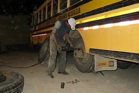 Changing the tire Nica style with us all on the bus