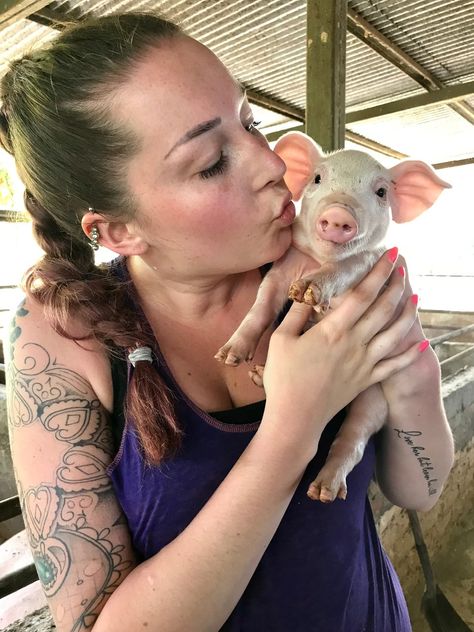 Morgan and her piglet friend bonding. He is so..... cute