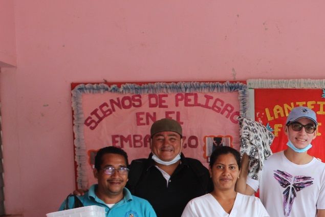 Dropping off a new sewing machine , supplies and material for expectant mothers to make baby clothes.
