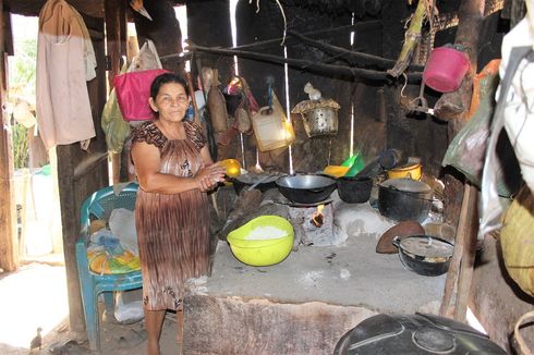 Pictured here is the kitchen of one of the stove lottery winners who will receive a new stove. This one is smokey and hot