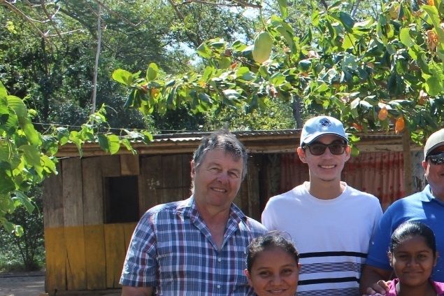 Giving some food to family.