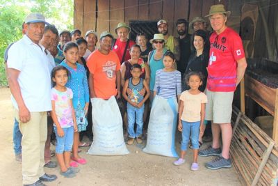 Proud of the 2 thousand pounds of organic fertilizer that they made to improve the soil quality