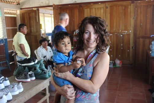 Janice babysitting baby at clinic while mom being seen