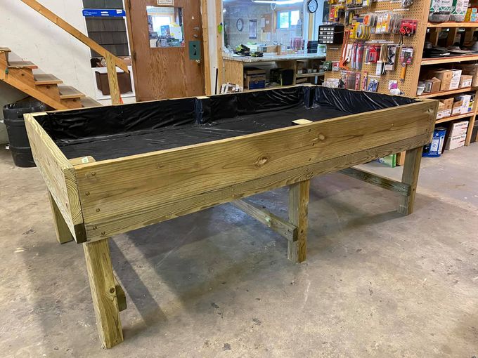 Above ground Garden Table. This is a 4x8 table 8 3/8deep made with treated wood, heavy duty screws, drain holes in the bottom and lined with landscape fabric.  This is a DIY kit for $310.00 which includes tax. Please call if you are interested...Thank you!