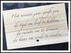 Houten wenskaart nieuwjaar