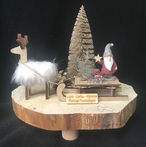 Kerststukje met lichtjes en slee
