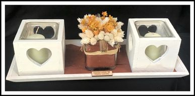 Bloemstukje met kaarsjes