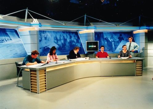 I'm the one in red ! Peter Sissons centre studying his notes!