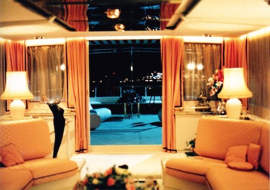 The studio interior (see construction drawing below) with nightime view 'across the harbour' - cleverly achieved with some judiciously placed Christmas lights! The exterior deck matched with our location boat in Antibes harbour!