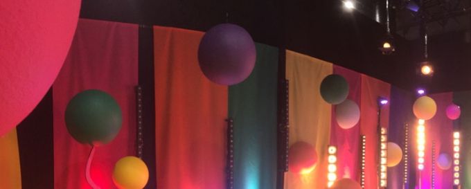 The larger set width, illuminated YO and new floor with logos