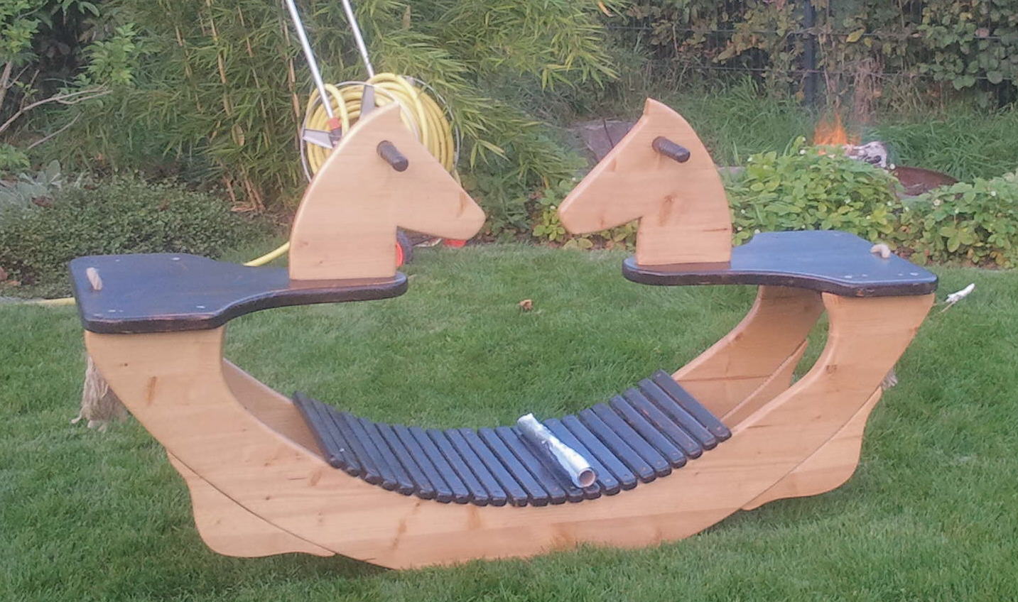 Foto Doppelschaukelpferd aus Holz