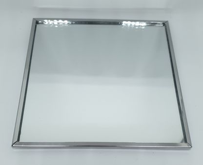 Miroir avec bord argenté