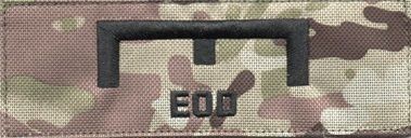 Bæres af EOD (Explosive Ordnance Disposal) personel.