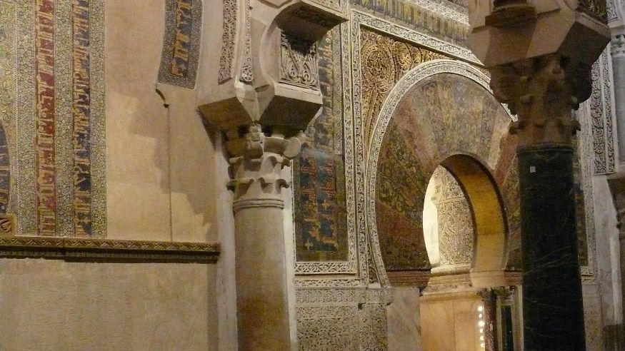 The Mihrab. This prayer niche, richly ornamented, held a gilt copy of the Koran. The worn flagstones indicate where pilgrims circled it seven times on their knees.