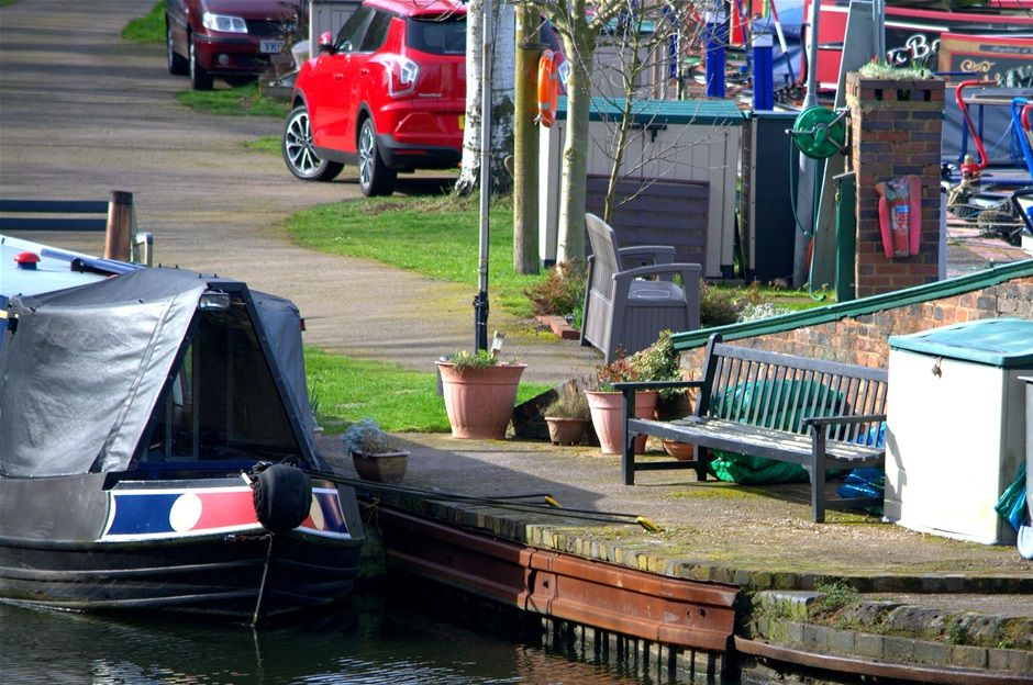 Coombeswood Marina, Fisher boy in bronze by Anita Lafford