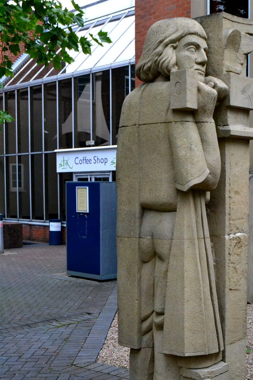 The Broadway. In courtyard of College Objects of technology in York stone designed by Steve Field, sculpted by John Vaughan