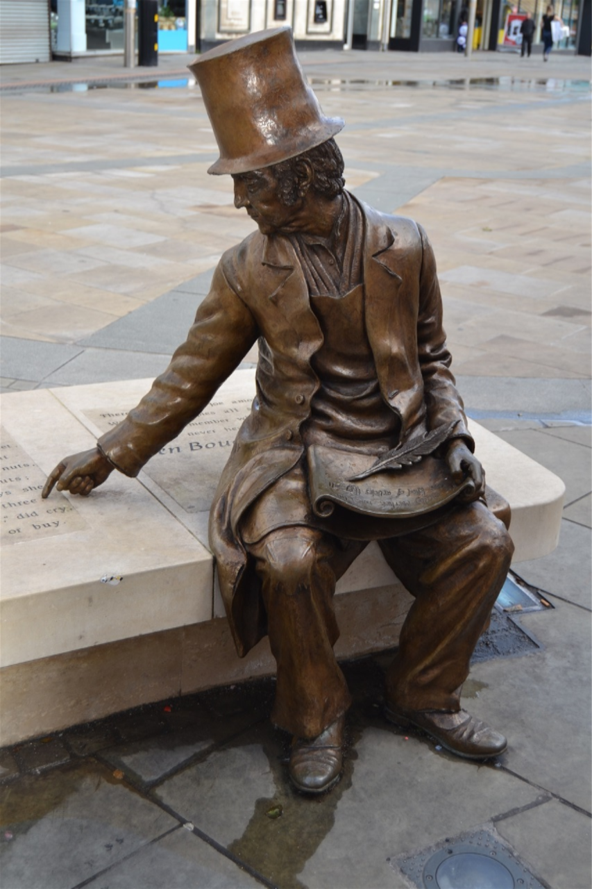 Market Place. Ben Boucher designed by Steve Field carved by John McKenna 2016