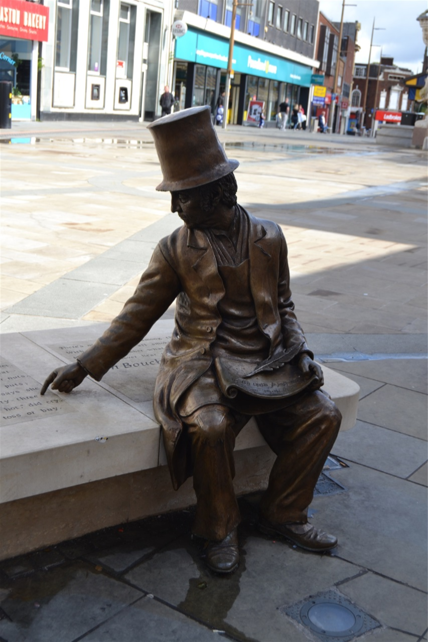 Market Place. Ben Boucher designed by Steve Field carved by John McKenna 2016