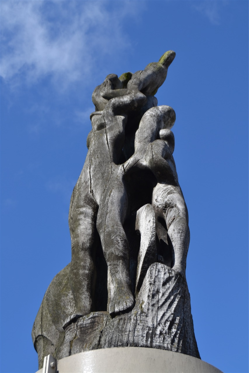 King st .Family group carved by E B Copnall in elm 1969