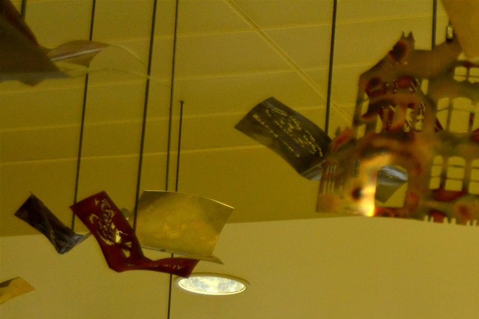Crown centre. 500 metal hangings relating to literature. ISH
