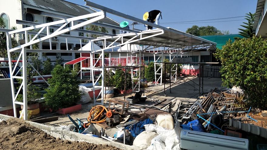 # 12 A walkway is being built between the new building and the school administration, which is temporarily housed next to the playground :)