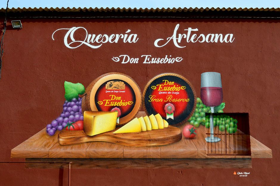 Arte mural "Bodegón manchego Quesos Don Eusebio". Estudio Aerosol ©.