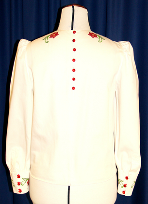Blus med maskinbroderi