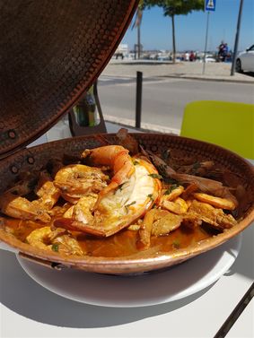 Cataplana de peixe in one of the many fish restaurants in Setúbal