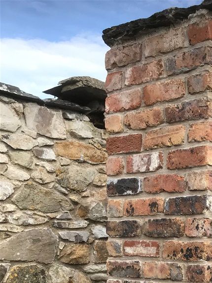............and after restoration including a slate coping stone