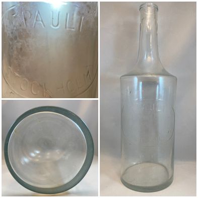 F-pauli-stockholm-en-liter-stor-vit-klarglas-textflaska-flaska-relierf