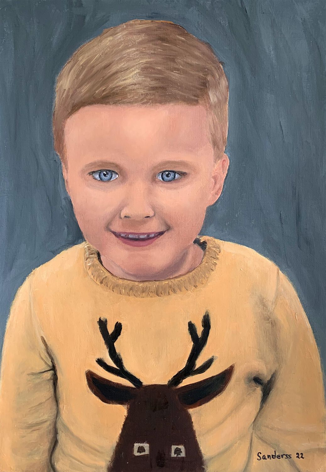 Portrait of a boy with a new haircut