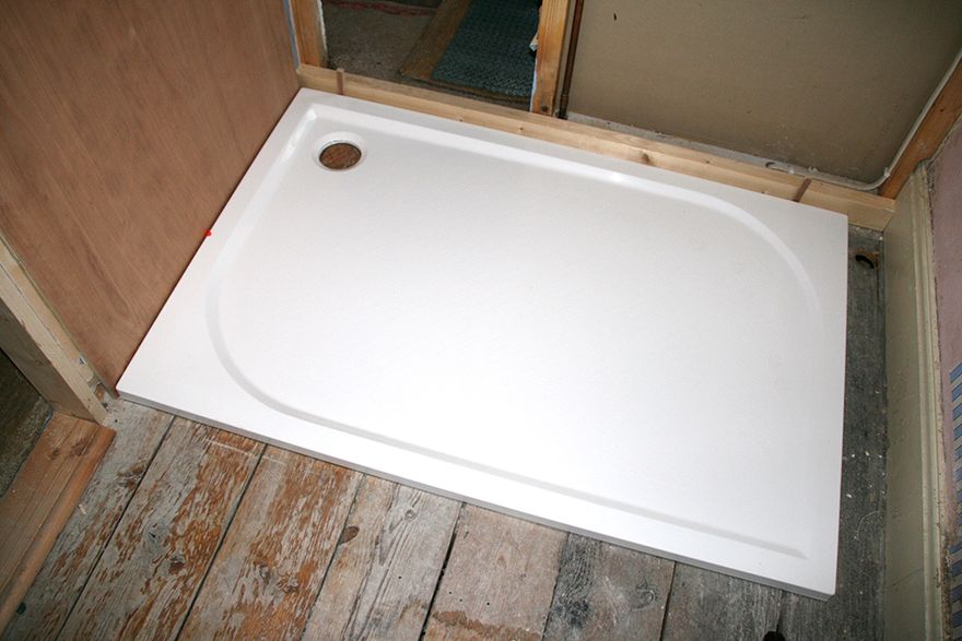 the new shower trayin place for marking up and drilling...