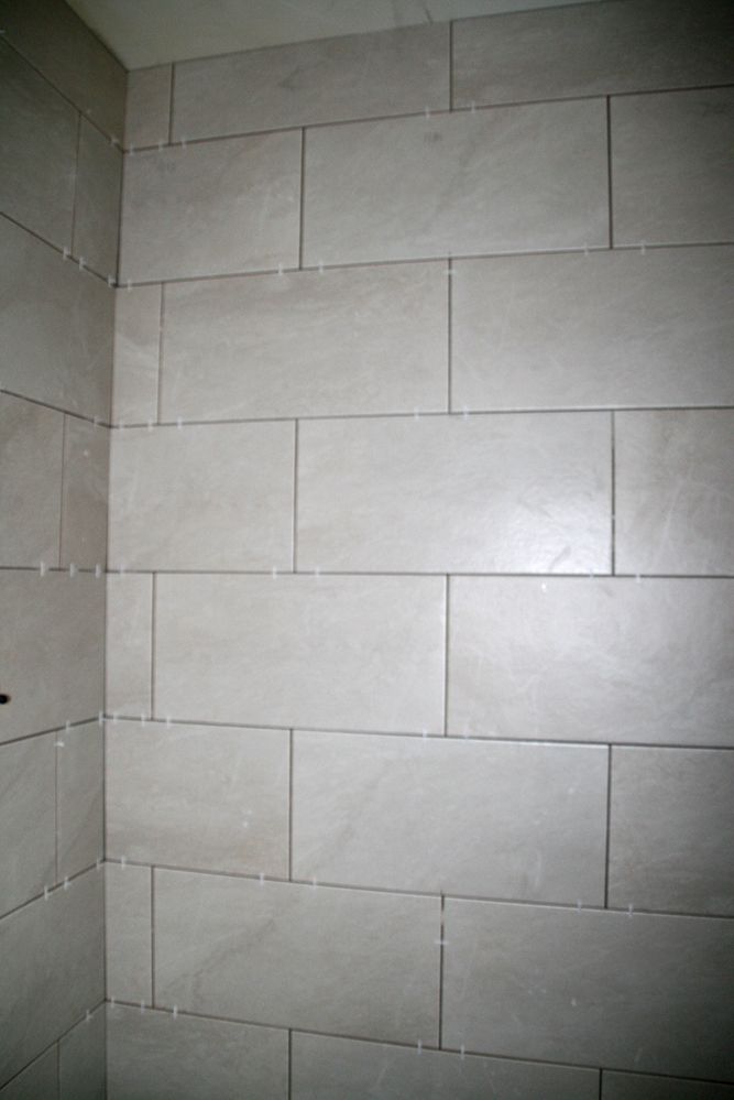the ensuite shower is tiled and looks very smart...