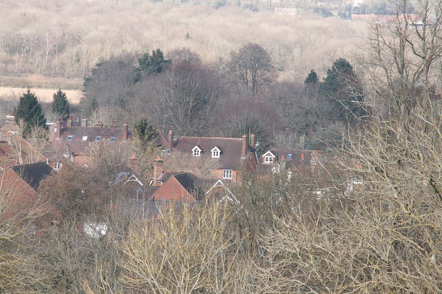 mum and dad's house from the hill - it's the one with two gable windows in the roof