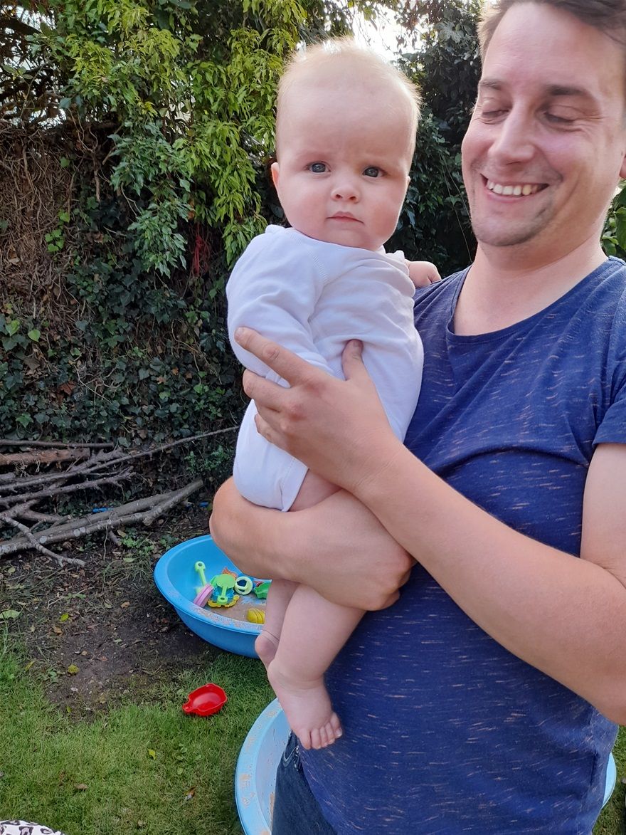 Seth holding baby Tadgh - he's so cute!
