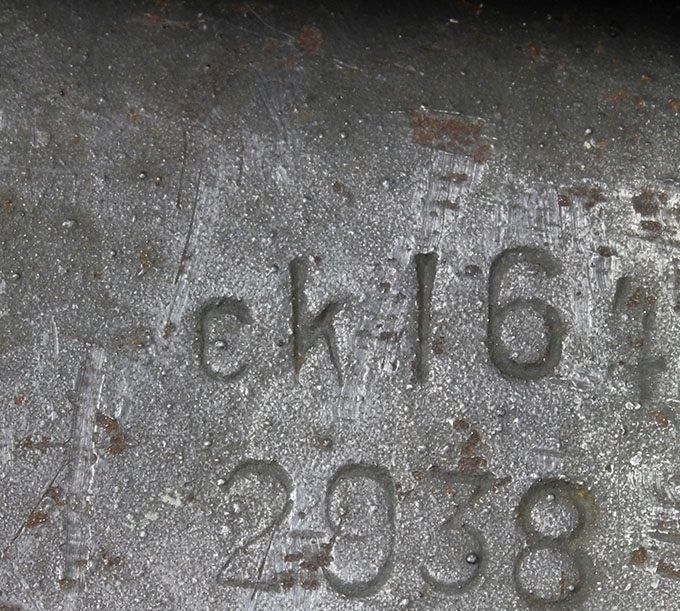 The same producer, Eisenhüttenwerke - Thale, this time with a ckl stamp. The change in manufacturer code from ET to ckl occurred during final production of the M40 and initial production of the M42 models. M42s  can be found with ET stamps and M40s with ckl stamps. The change to an ordnance code (ckl) was to protect the identity and location of the manufacturer from the Allies. Notice the lot number «2938». The lot number indicates the particular batch of sheet steel that was used when a quantity of helmet shells were produced. This was accomplished through several steps of press-forming or hot-stamping the shells. The lot number serves as a control number for the manufacturer and as an extra stamp of approval. 
 